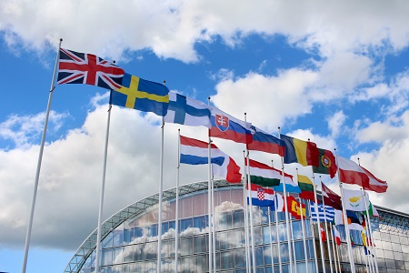 EU flags with clouds.jpg